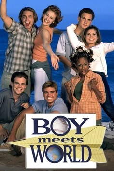 the cast of boy meets world poses for a photo in front of the ocean and beach