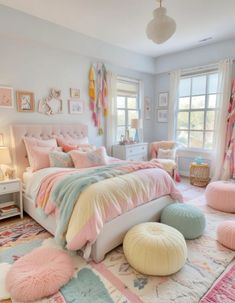 the bedroom is decorated in pastel colors