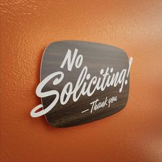 there is a sign that says no soliciing thank you on the side of a wall