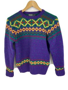 Vintage 1980s Polo Ralph Lauren Size Small Purple Multicolor Wool Pullover Crew Lodge Fair Isle Sweater I believe this is a children's small. Please see actual Measurements (taken laid flat, as shown in pics):  Chest (Across chest underarm to underarm, doubled)  16" across. 32" doubled.  Length (From top of shoulder, to the bottom hem)  22" Sleeve length (From seam of the underarm, to outer cuff of sleeve) 16.5" with sleeves folded, 19" unfolded Waist band at bottom of sweater: 12" across.  Gent Wool Pullover, Fair Isle Sweater, Awesome Stuff, Fair Isle, Polo Ralph, Polo Ralph Lauren, Ralph Lauren, Cuff, Sleeve Length