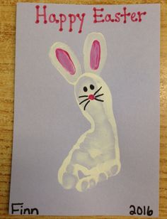 an easter bunny handprinted on a piece of paper