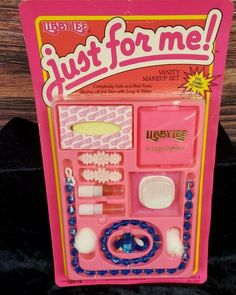 a pink toy set with jewelry and accessories