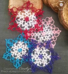 four crochet doily designs on wood slices with flowers in the center and snowflakes around them