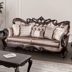 a living room filled with furniture and a coffee table in front of a wall mounted clock