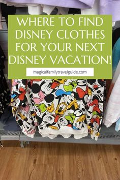 a closet filled with disney shirts and other items that are for sale on the shelves