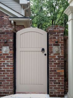 an open door to a brick house