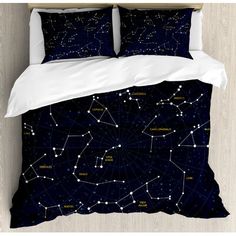 an image of a bed set with the stars in the night sky on it's side