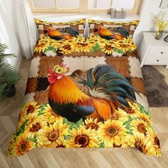 a rooster and sunflowers are on the floor next to each other in this bedding set