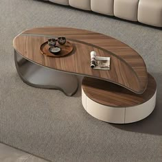 a modern coffee table in the middle of a living room