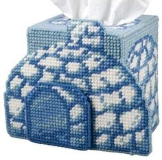 a tissue dispenser made out of blue and white fabric