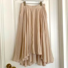 Mable Hi Low Flowy Pull-On Skirt With Pockets. Neutral/Sand Labeled As Size M But Fits Like S. See Waist Measurement. Nwt. Goes With Sneakers, Sandals, Heels, Or With Boots In The Fall. 3 Season Wear. Beige Pleated Bottoms For Daywear, Beige Lined Maxi Skirt For Daywear, Beige Lined Maxi Skirt For Day Out, Beige Pleated Asymmetrical Skirt, Beige Tiered Skirt For Daywear, Daywear Beige Flared Skirt, Beige Summer Maxi Skirt For Day Out, Beige Midi Skirt For Summer, Beige Tiered Lined Skirt