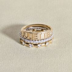 This classic nameplate style ring from the Juliette Maison collection features an engravable name or word of your choice (up to 8 upper-case letters), hugged by two dainty round diamonds. Wear it as a statement or expression of love for a person or place you want to keep close to you always. Fashioned in 10K rose gold. the total diamond weight of the ring is 1/20 carat. This ring may be personalized with 1 to 8 letters. Nameplate Ring, Name Ring, Jared The Galleria Of Jewelry, Name Rings, Upper Case, Love Ring, Engraved Rings, 10k Gold, Stacking Rings