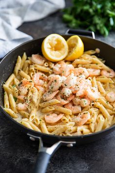 pasta with shrimp and lemon in a skillet