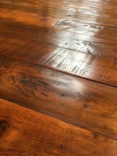 a wooden floor that has been stained brown