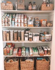 an organized pantry with baskets and food items