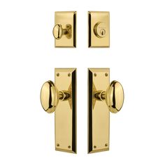 three brass door handles and two knobs