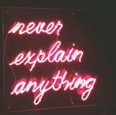 a neon sign that says never explain anything in white letters on a dark background with red lighting