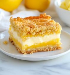 a slice of lemon crumb cake on a plate