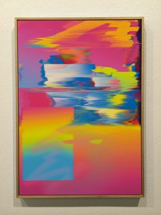 a painting hanging on the wall in front of a white wall with an orange and pink background