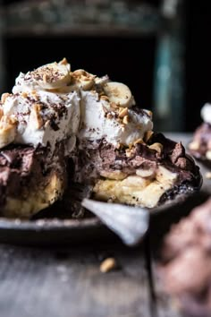 a chocolate dessert with bananas and whipped cream