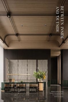 a large room with tables and chairs in it's center wall is featured on the cover of an architectural magazine