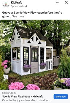 a small white house with pink flowers in the front yard and an ad for kidskrat