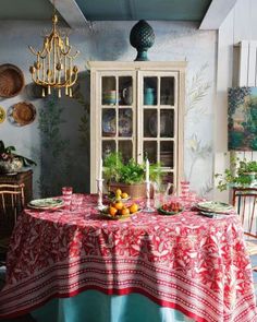 a red table cloth on a dining room table