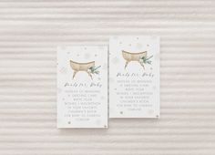 two white tags with gold foil and snowflakes on them, one says bridals party