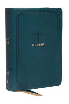 a blue bible with gold lettering on the front and side, sitting in an open book