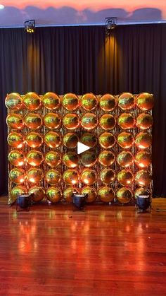 a large display with many shiny balls on it