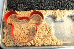 a mickey mouse cookie pan with rice in it