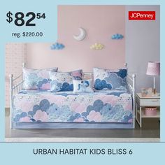 a bed with blue and pink clouds on it is for $ 82 95 reg $ 200 00