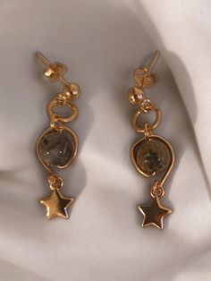 The "Celestial Jasper Earrings" are a striking blend of elegance and earthy beauty. Featuring exquisite fancy jasper stones, each earring showcases unique patterns and colors, reminiscent of a starry night sky. Set in radiant rose gold, these earrings add a touch of warmth and sophistication to any look. Their lightweight design ensures comfortable wear, making them perfect for both casual outings and special occasions. Illuminate your style with the enchanting allure of the Celestial Jasper Earrings, a perfect accessory for those who appreciate the beauty of nature and the cosmos. Earthy Beauty, Buy Earrings Online, Fancy Jasper, A Starry Night, Jasper Earrings, Buy Earrings, Ear Stack, Starry Night Sky, Jasper Stone