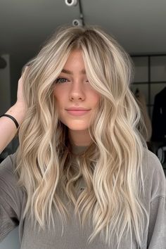 From classic light blonde balayage styles to high-contrast black and blonde ombre looks, there's a ton of ways to rock blonde hair. Click through for 40+ examples of the hottest blonde hair colors or save this pin for later! Hair Highlights For Light Hair, Blonde Balayage On Light Hair, Highlight Hair Ideas Blonde, Long Balayage Hair Blonde, Blonde Hair Inspo Highlights, Highlight In Hair, Blonde Hair With Blended Roots, Blonde With Natural Roots