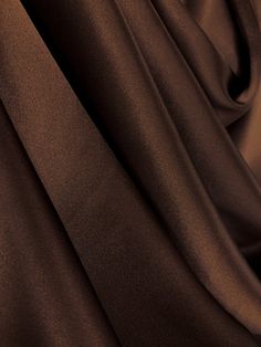 a close up view of a dark brown fabric