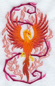 the embroidery design shows an orange and red bird with large wings, on white fabric