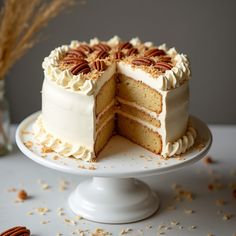 there is a cake that has been cut in half on a plate with one slice taken out