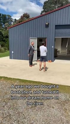 two men standing in front of a building with a quote on it that says, a year ago we bought a boat shed and turned it into our dream home on the river