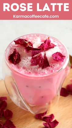 rose latte in a glass with ice and flowers