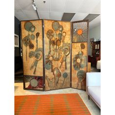 three panel room divider with flowers and sunbursts