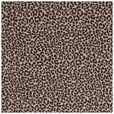 a brown and white animal print rug