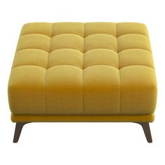 a yellow ottoman with wooden legs on a white background