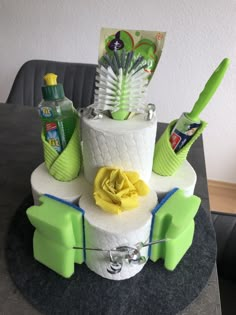 a cake decorated with green and white items