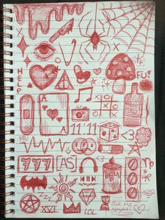 a notebook with some drawings on it and writing in red ink, all over the page