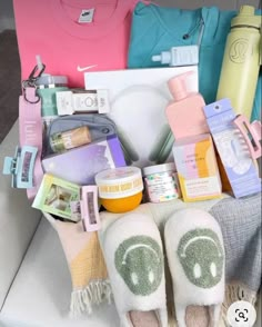 the contents of a woman's personal care kit are neatly arranged in a chair