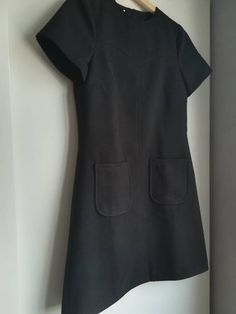 Made under request! Handmade dress in soft wool with lining 90%polyester 2%elastan 8%viscose Color: Black You can see here an example on a coat from the fabric https://www.etsy.com/listing/206734254/mod-wool-coat-60s-retro-soft-light-blue?ref=shop_home_active_1 You can choose your own measurements, length. Special request are easy, just add this listing to your cart https://www.etsy.com/listing/624364219/special-requests?ref=shop_home_active_25 If you want it on a rush you have priority shipping Knee-length Lined Midi Dress For Work, Black Wool Dress, 60s Mini Dress, 60s Women, Custom Made Dress, 60s Retro, Made Dress, 1960's Dress, Dress Winter