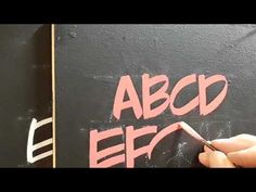 someone is writing the word abcd eff on a blackboard