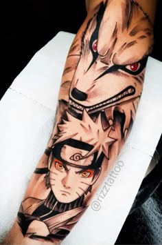 an arm with some tattoos on it and two wolfs next to eachother