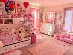 a bedroom with hello kitty decorations and pink furniture, including a child's bed