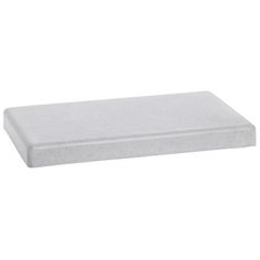 a white foam mattress on a white background